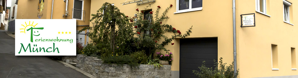 Ferienwohnung Münch: Hauseingang mit Außentreppe